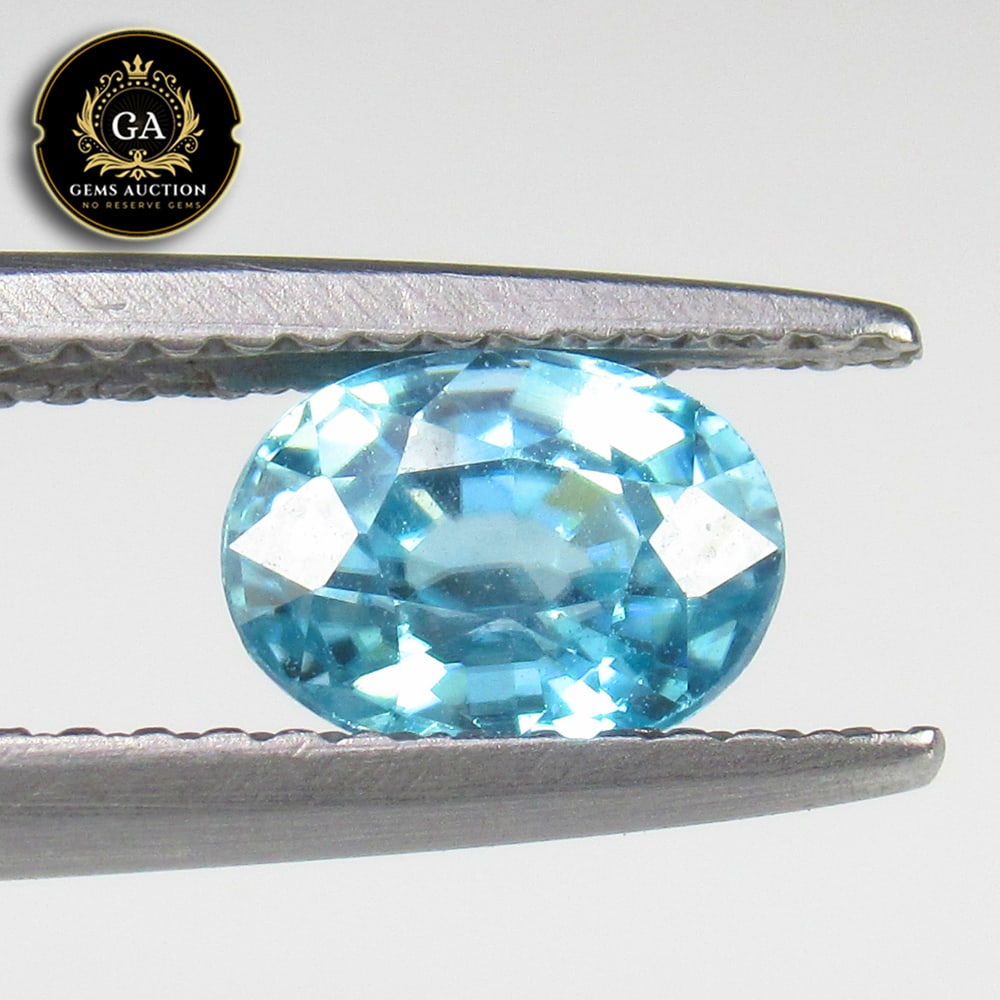 1.46 Ct Natural Clean Blue Zircon Oval Cut: Weight - 1.46 Ct / Size - 7.00 x 5.50 x 4.00 mm / Shape - Oval Cut / Color - White / Clarity - VVS / Origin - Cambodia / Treatment - Gentle Heat
