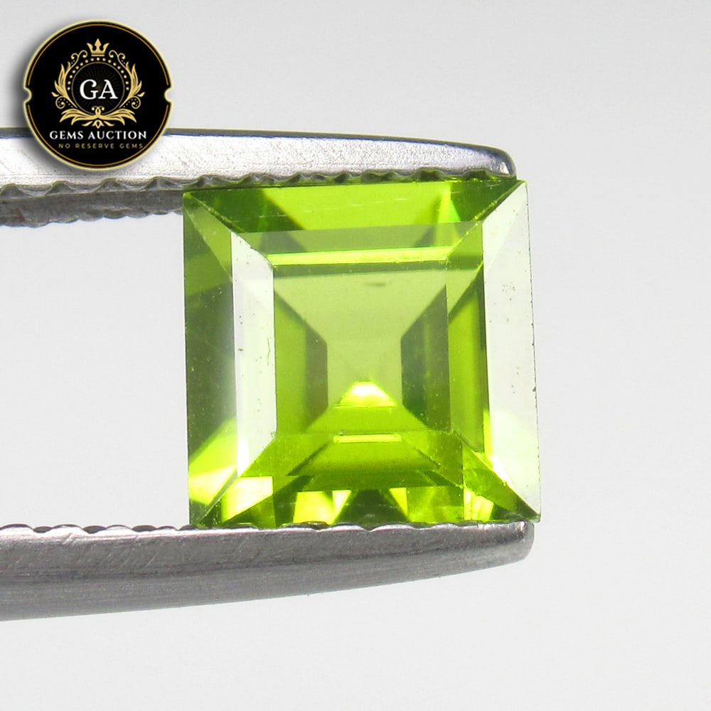 1.32 Ct Natural Parrot Green Peridot Square Cut: Weight - 1.32 Ct / Size - 6.10 x 6.10 x 4.00 mm / Shape - Square Cut / Color - Green / Clarity - VVS / Origin - Pakistan / Treatment - None