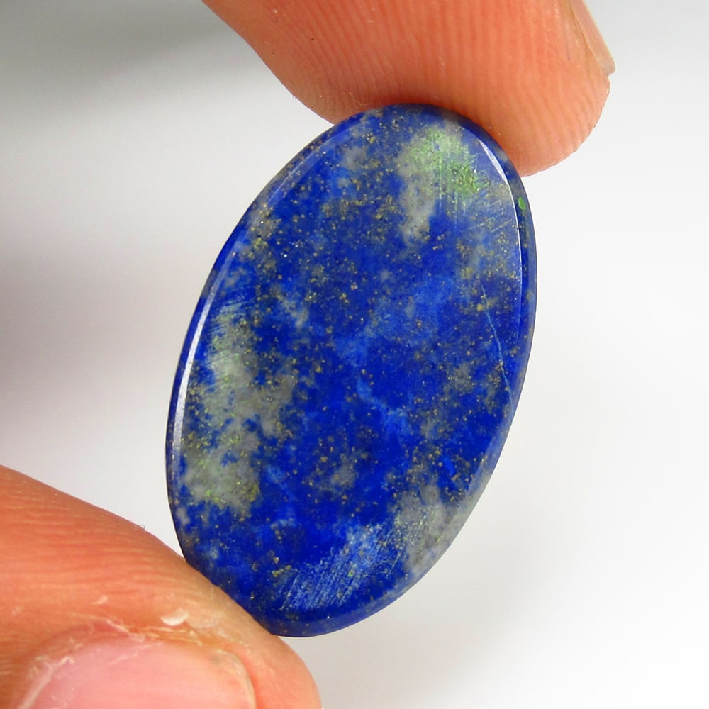 16.69 Ct Natural Blue Lapis Lazuli Oval Cab: Weight - 16.69 Ct / Size - 21.00 x 14.50 x 5.00 mm / Shape - Oval Cab / Clarity - Opaque / Origin - Ethiopia / Treatment - None