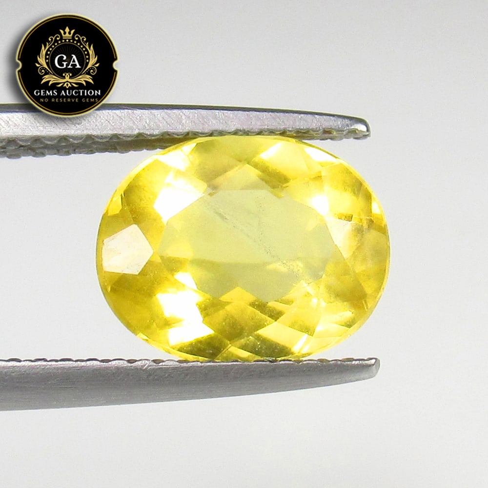 2.23 Ct Natural Yellow Beryl Oval Cut: Weight - 2.23 Ct / Size - 10.00 x 8.00 x 4.50 mm / Shape - Oval Cut / Color - Yellow / Clarity - VVS / Origin - Brazil / Treatment - None