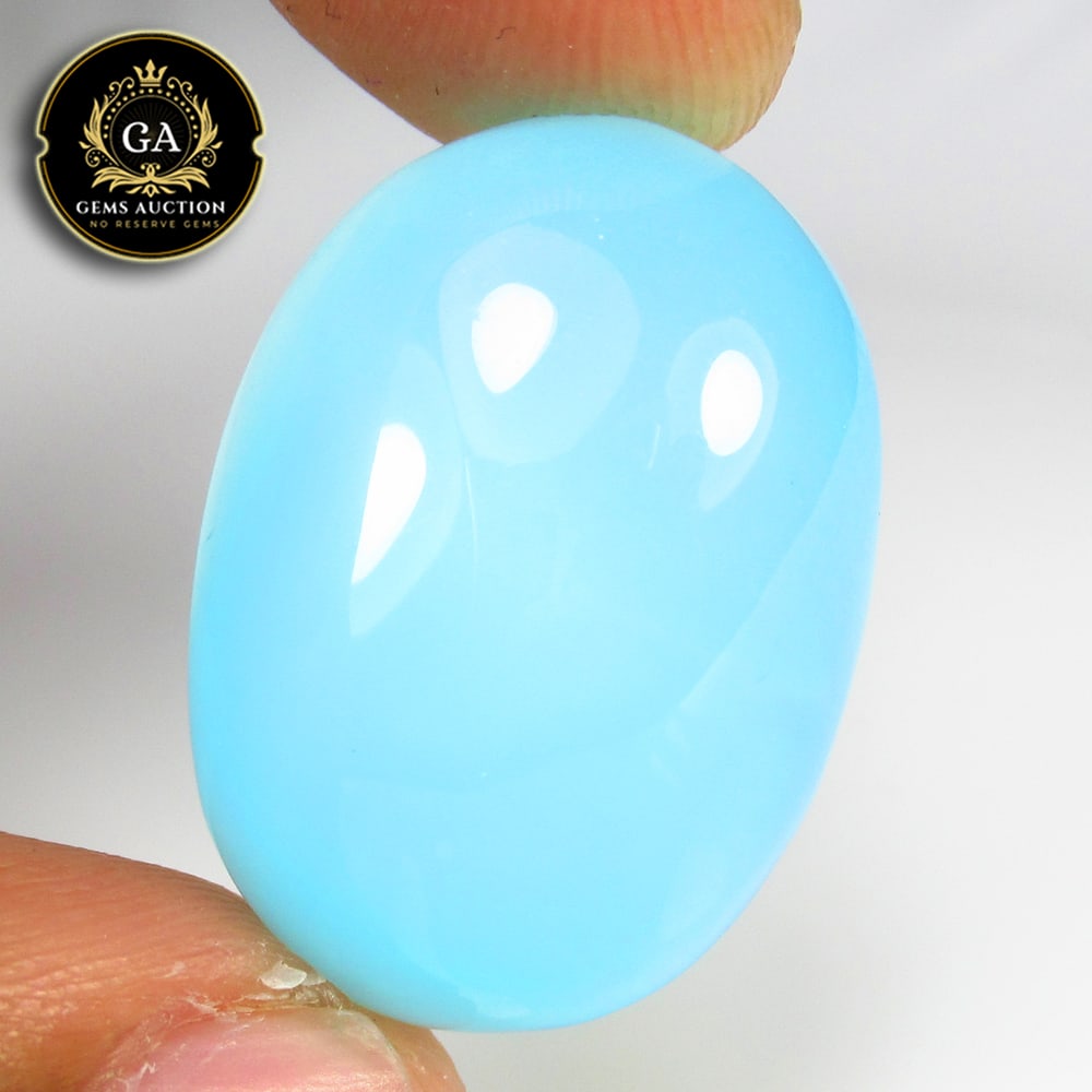 23.35 Ct Natural Blue Opal Oval Cab (1 of 2)