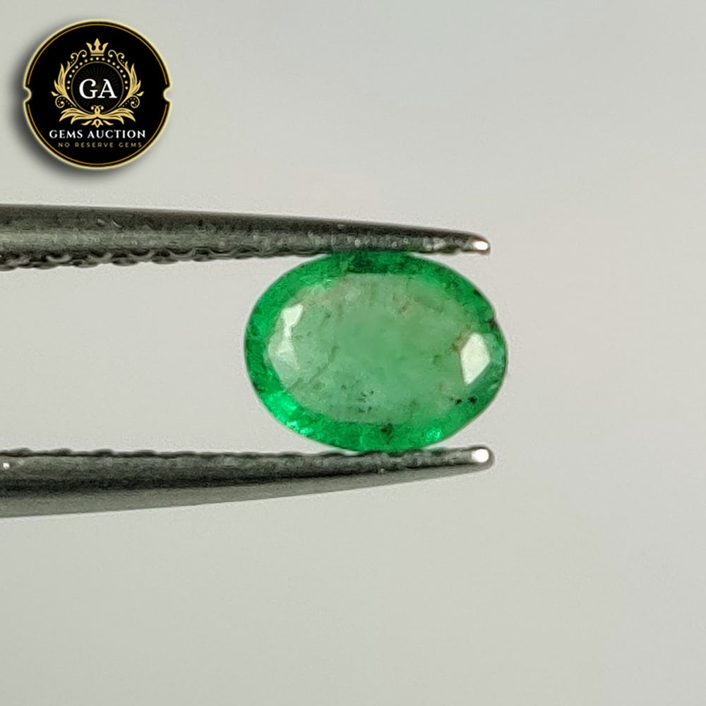 0.39 Ct Natural Zambian Emerald Oval Cut: Weight - 0.39 Ct / Size - 5.50 x 4.30 x 2.40 mm / Shape - Oval Cut / Color - Green / Clarity - SI / Origin - Zambia / Treatment - Colorless Oil