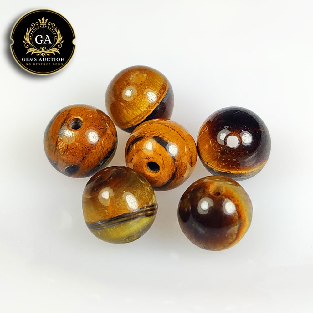 24.46 Ct Natural Tiger's Eye Round Ball Beads: Weight - 24.46 Ct / Size - 8.30 - 8.50 mm / 6 Pc's / Shape - Round Ball Beads / Clarity - Opaque / Origin - Burmese / Treatment - None