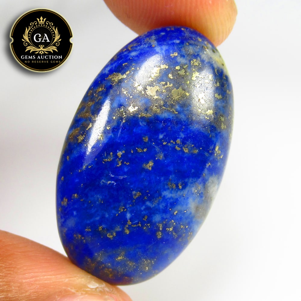 43.18 Ct Natural Blue Lapis Lazuli Oval Cab: Weight - 43.18 Ct / Size - 31.00 x 18.30 x 8.00 mm / Shape - Oval Cab / Clarity - Opaque / Origin - Ethiopia / Treatment - None