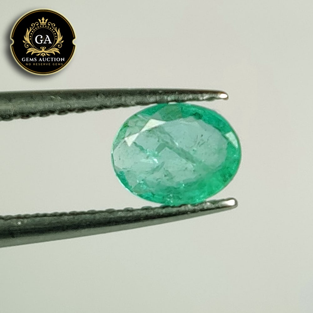0.46 Ct Natural Zambian Emerald Oval Cut: Weight - 0.46 Ct / Size - 6.10 x 4.70 x 2.20 mm / Shape - Oval Cut / Color - Green / Clarity - SI / Origin - Zambia / Treatment - Colorless Oil