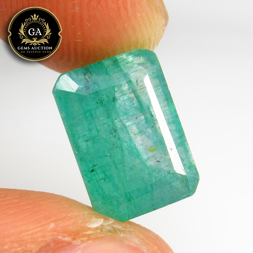 5.63 Ct Natural Green Emerald Octagon Cut: Weight - 5.63 Ct / Size -11.50 x 8.30 x 6.50 mm / Shape - Octagon Cut / Color - Green / Clarity - SI / Origin - Zambia / Treatment - Color Coated