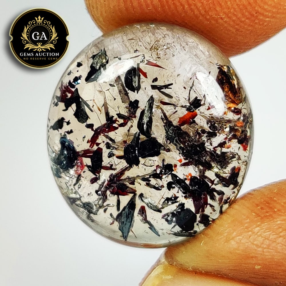 11.70 Ct Natural Rutile Quartz Oval Cab: Weight - 11.70 Ct / Size - 15.00 x 13.70 x 7.20 mm / Shape - Oval Cab / Clarity - Transparent / Origin - Norway / Treatment - None