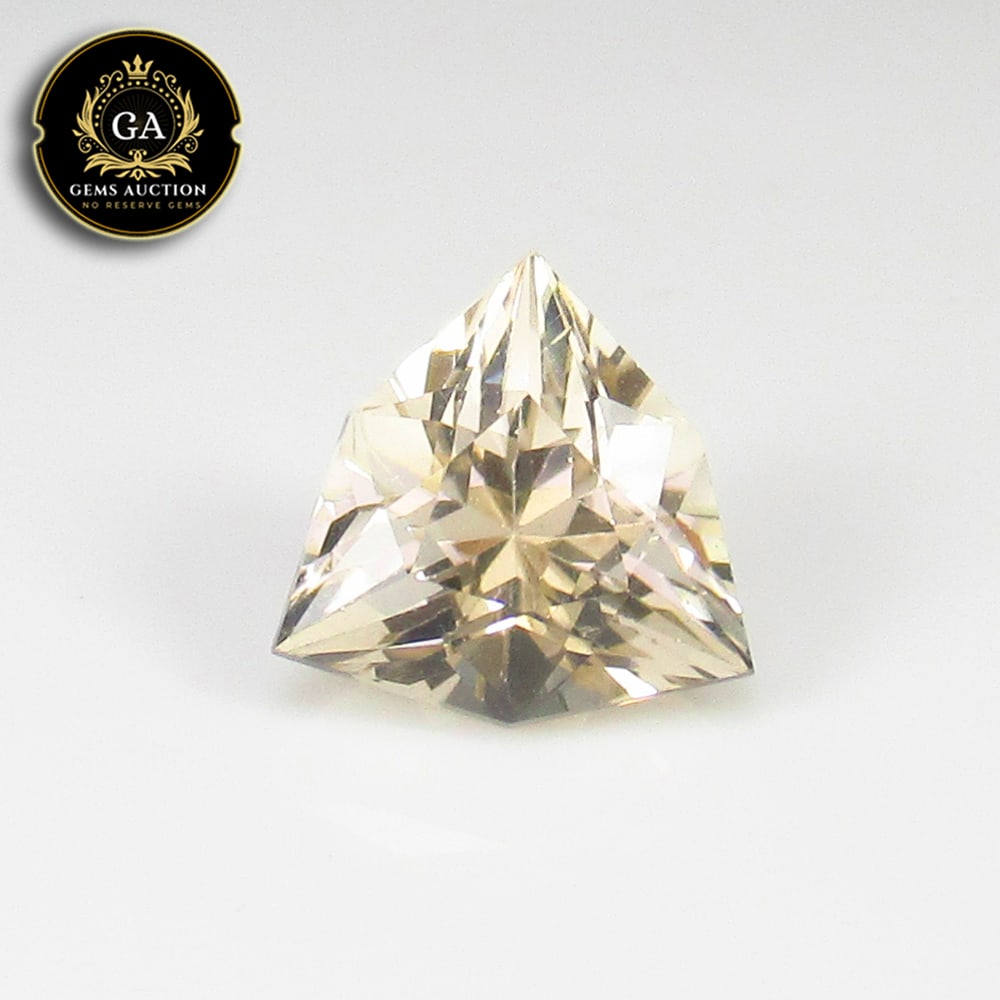 3.66 Ct Natural Yellow Citrine Trillion Cut: Weight - 3.66 Ct / Size - 10.60 x 10.60 x 7.90 mm / Shape - Trillion Cut / Color - Yellow / Clarity - VVS / Origin - Brazil / Treatment - None