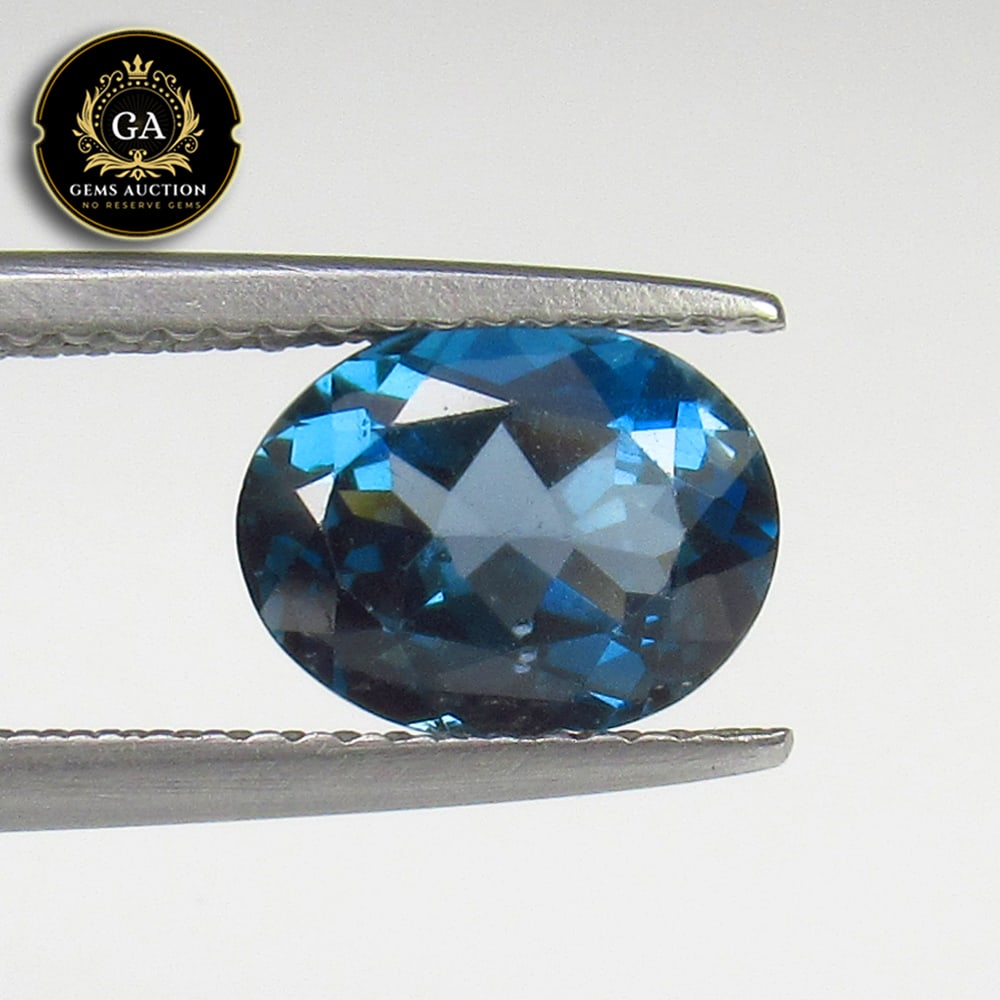 2.10 Ct Natural Beautiful London Blue Topaz Oval Cut: Weight - 2.10 Ct / Size - 9.00 x 7.00 x 4.30 mm/ Shape - Oval Cut / Color - Blue / Clarity - VVS / Origin - Brazil / Treatment - Irradiated