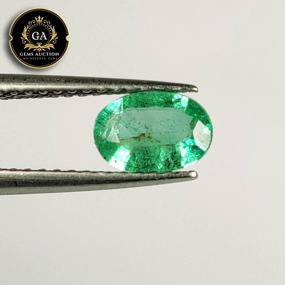 0.37 Ct Natural Zambian Emerald Oval Cut: Weight - 0.37 Ct / Size - 5.80 x 4.20 x 2.40 mm / Shape - Oval Cut / Color - Green / Clarity - SI / Origin - Zambia / Treatment - Colorless Oil