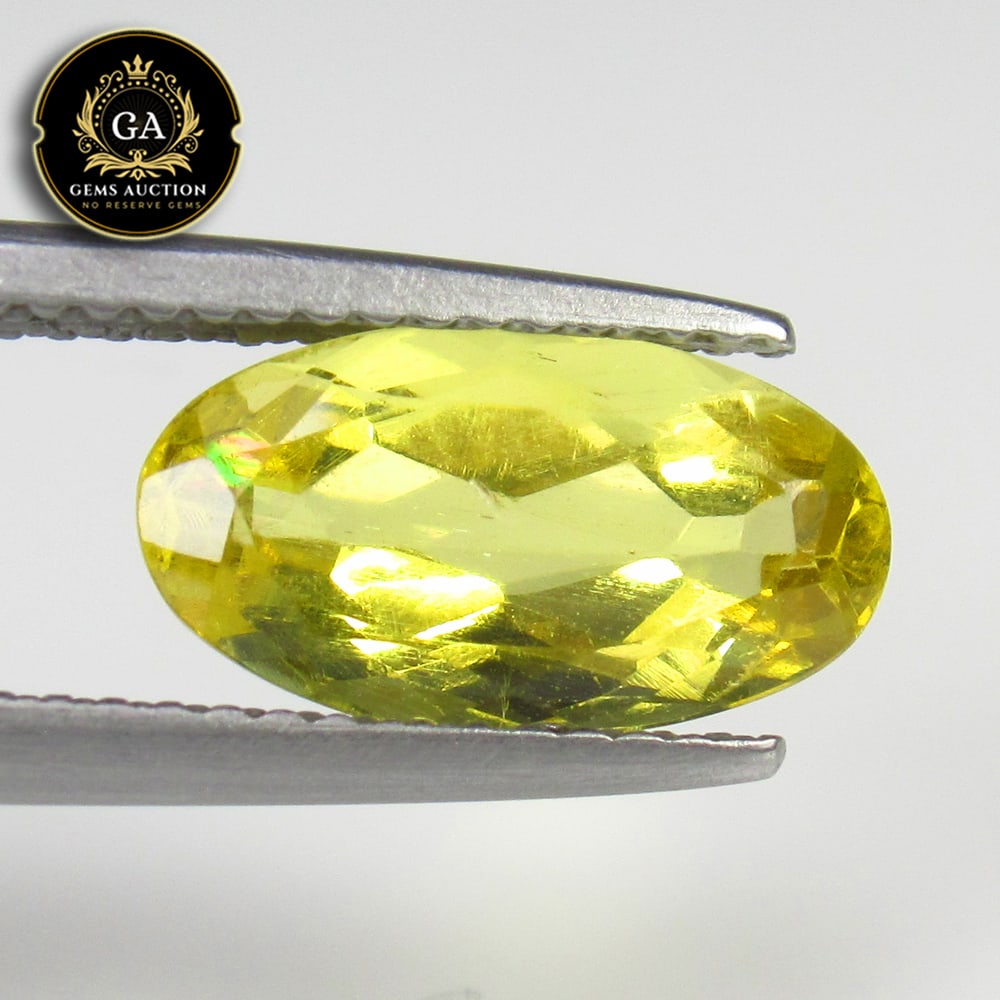 2.14 Ct Natural Yellow Beryl Oval Cut: Weight - 2.14 Ct / Size - 12.00 x 6.50 x 4.50 mm / Shape - Oval Cut / Color - Yellow / Clarity - VVS / Origin - Brazil / Treatment - None