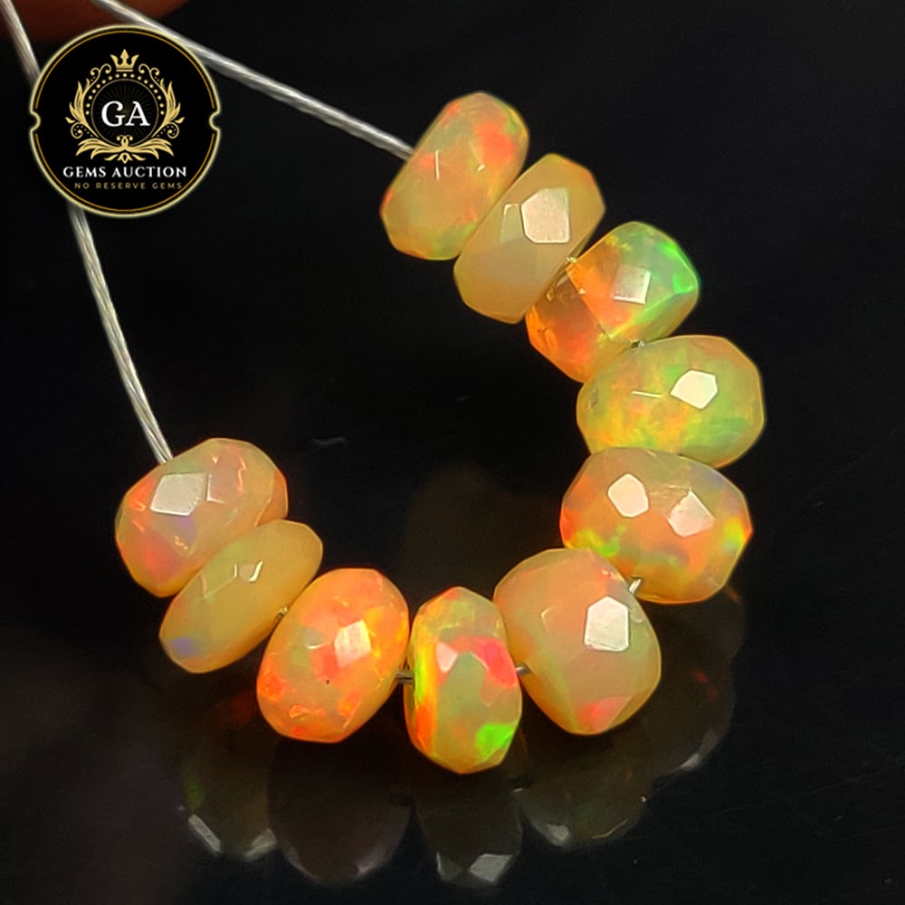3.85 Ct Natural Drilled Multi-color Fire Opal Round Beads: Weight - 3.85 Ct / Size - 5.40 - 5.60 mm / Pieces - 10 No's / Shape -Round Beads / Color - Multicolor / Clarity - Transparent / Origin - Ethiopia / Treatment - None