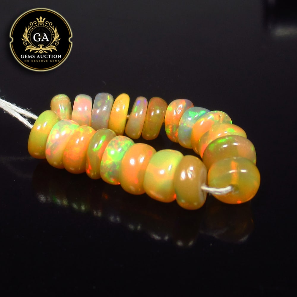 4.77 Ct Natural Drilled Multi-color Opal Good Fire Round Beads: Weight - 4.77 Ct / Size - 4.60 - 4.90 mm / 20 Pc's / Shape -Round Beads / Color - Multicolor / Clarity - Transparent / Origin - Ethiopia / Treatment - None