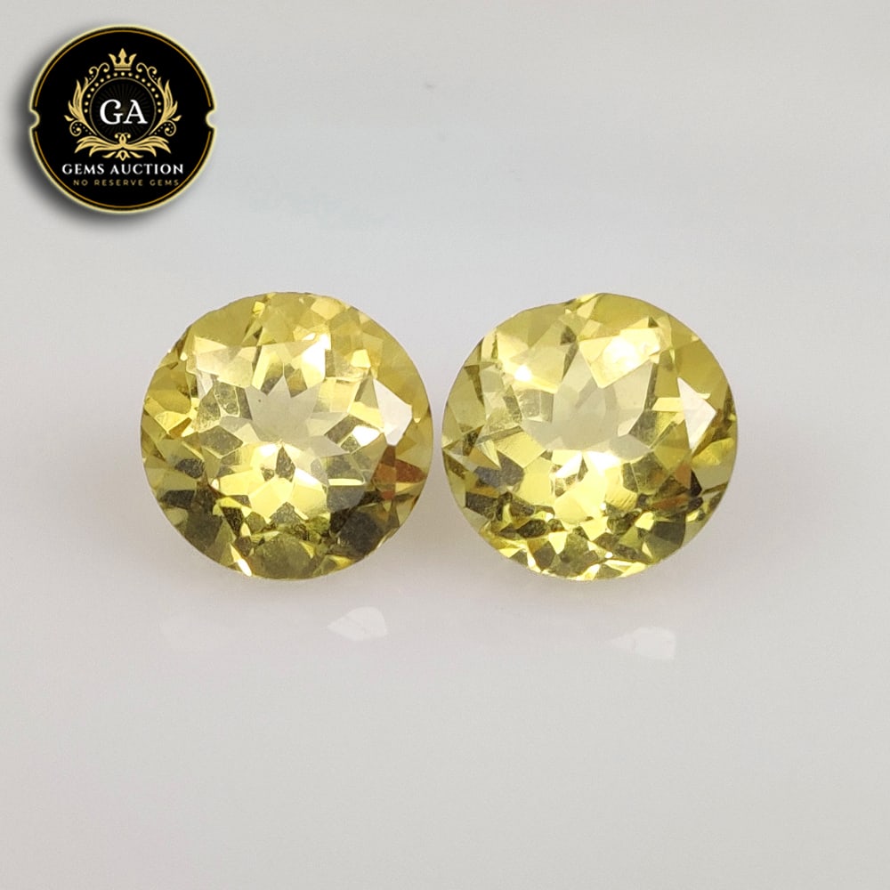 4.89 Ct Natural Yellow Citrine Round Cut Pair: Weight - 4.89 Ct / Size - 9.00 x 9.00 x 6.00 mm / 2 Pc's / Shape - Round Cut / Color - Yellow / Clarity - VVS / Origin - Brazil / Treatment - Heated