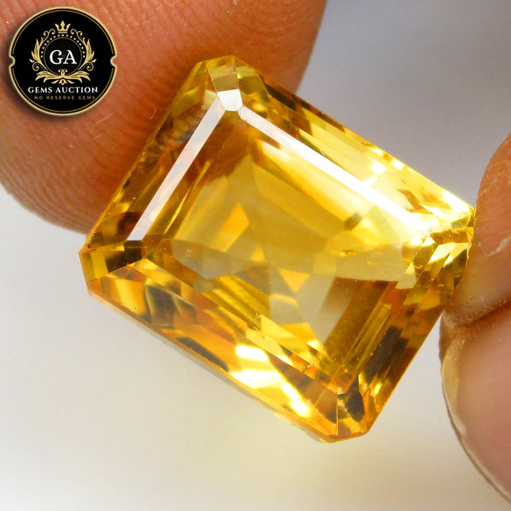 10.11 Ct Natural Citrine Octagon Cut: Weight - 10.11 Ct / Size - 12.70 x 10.40 x 9.60 mm / Shape - Octagon Faceted Cut / Color - Yellow Color / Clarity - VVS / Origin - Brazil / Treatment - None