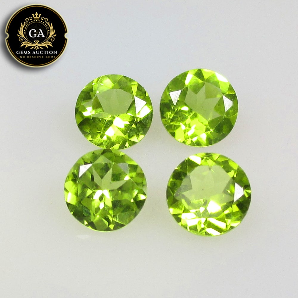 3.19 Ct Natural Parrot Green Peridot Round Cut Set: Weight - 3.19 Ct / Size - 5.90 - 6.10 mm / 4 Pc's / Shape - Round Faceted Cut / Color - Green / Clarity - VVS / Origin - Pakistan / Treatment - None