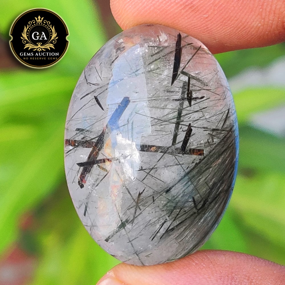 67.28 Ct Natural Black Hair Rutile Quartz Pear Cab: Weight - 67.28 Ct / Size - 35.00 x 25.00 x 12.00 mm / Shape - Pear Cab / Clarity - Transaprent / Origin - Norway / Treatment - None
