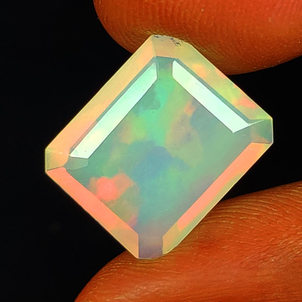 CERTIFIED 3.27 Ct Natural Opal Emerald Cut: Weight : 3.27Ct / Shape : Emerald Cut / Size : 13.0 x 10.9 x 5.0 mm / Color : White / Transparency : Semi - Transparent / Treatment : None, Play of color effect