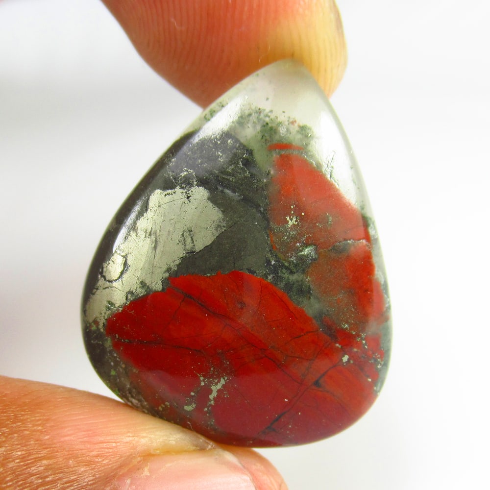 24.31 Ct Natural Bloodstone Jasper Quartz Pear Cab: weight - 24.31 Ct / Dimensions - 26.00 x 21.00 x 5.30 mm / Shape & Cut - Excellent Pear Cab / Origin - Brazil / Comments - None