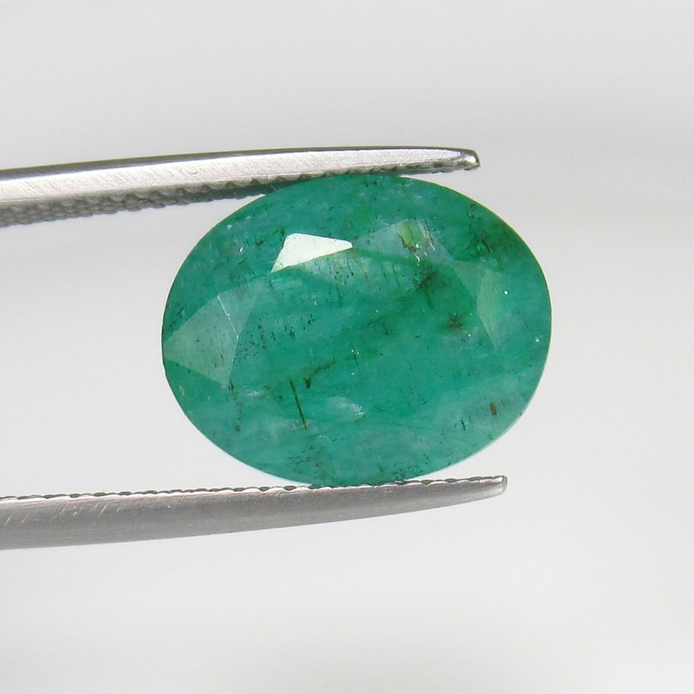 6.69 Ct Natural Green Emerald Oval Cut: Weight - 6.69 Ct / Dimensions - 13.50 x 11.00 x 6.70 mm / Shape & Cut - Oval Cut / Color - Green / Transparency - SI / Origin - Zambia / Comments - Color Coated
