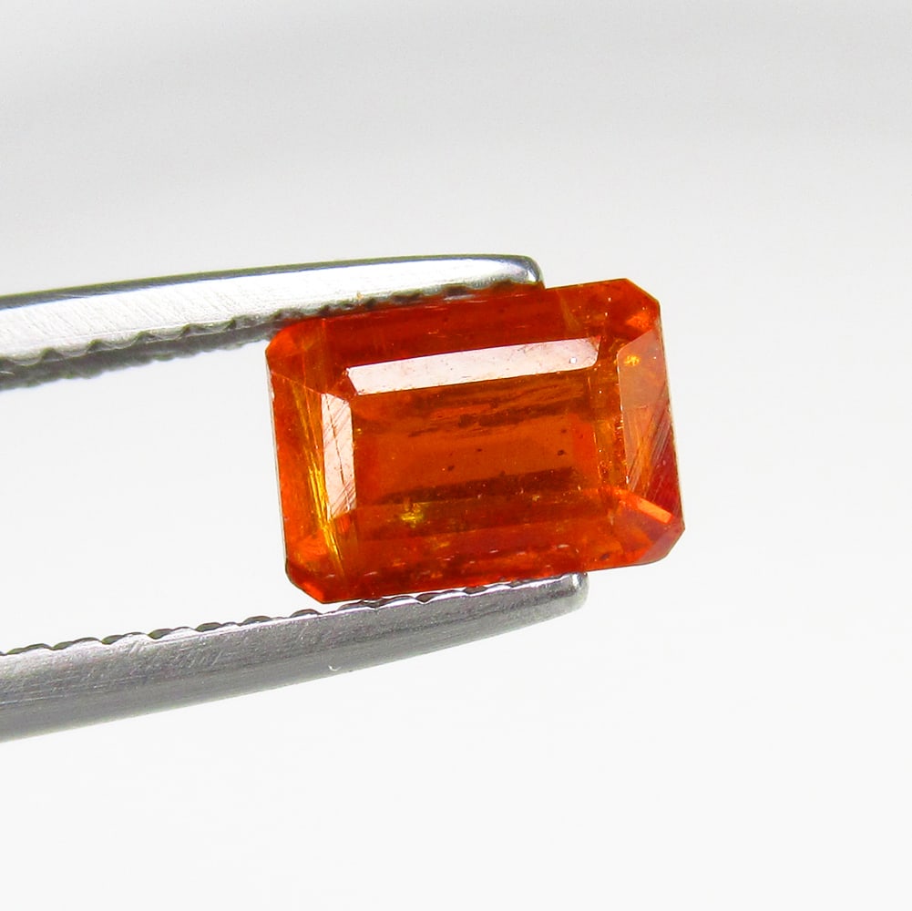 1.70 Ct Natural Orange Kyanite Emerald Cut: Weight - 1.70 Ct / Size - 7.30 x 5.30 x 4.20 mm / Shape - Emerald Cut / Color - Orange / Clarity - SI / Origin - India / Treatment - None