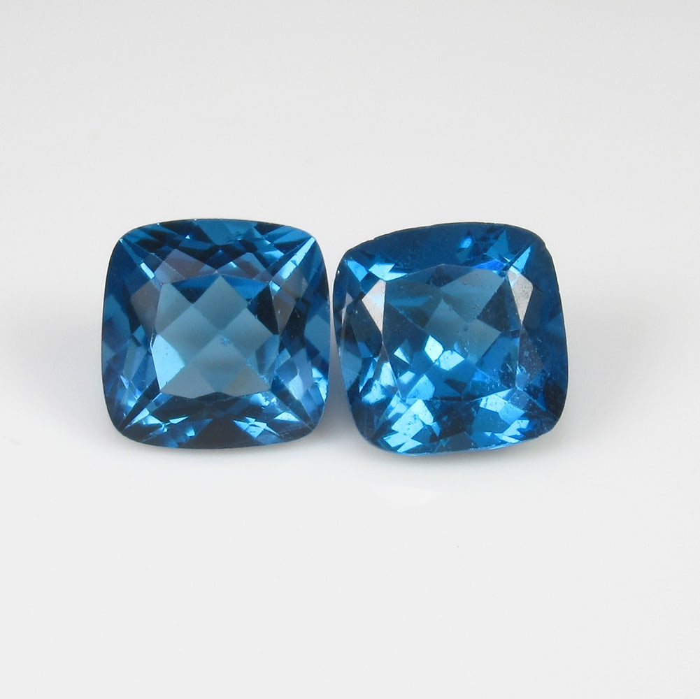 6.32 Ct Natural London Blue Topaz Cushion Cut Pair: Weight : 6.32 Ct / Dimensions : 38.00 x 8.00 x 5.50 mm / 2 Pc's / Shape : Cushion Cut / Color : Blue / Transparency : Transparent / Treatment : Heated