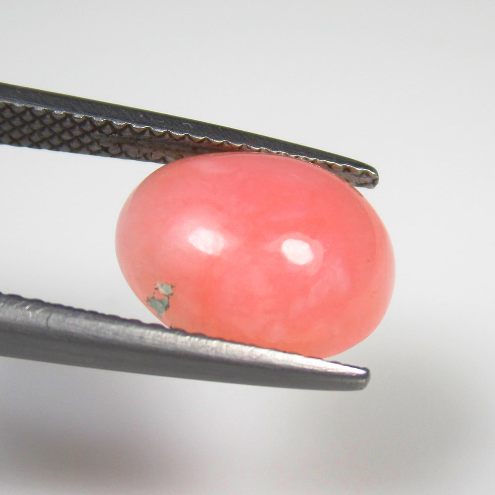 3.06 Ct Natural Pink Opal "PEPPERMINT" Oval Cab: Weight - 3.09 Ct / Size - 12.00 x 10.00 x 4.70 mm / Shape - Oval Cab / Color - Pink / Clarity - Opaque / Origin - Peru / Treatment - None