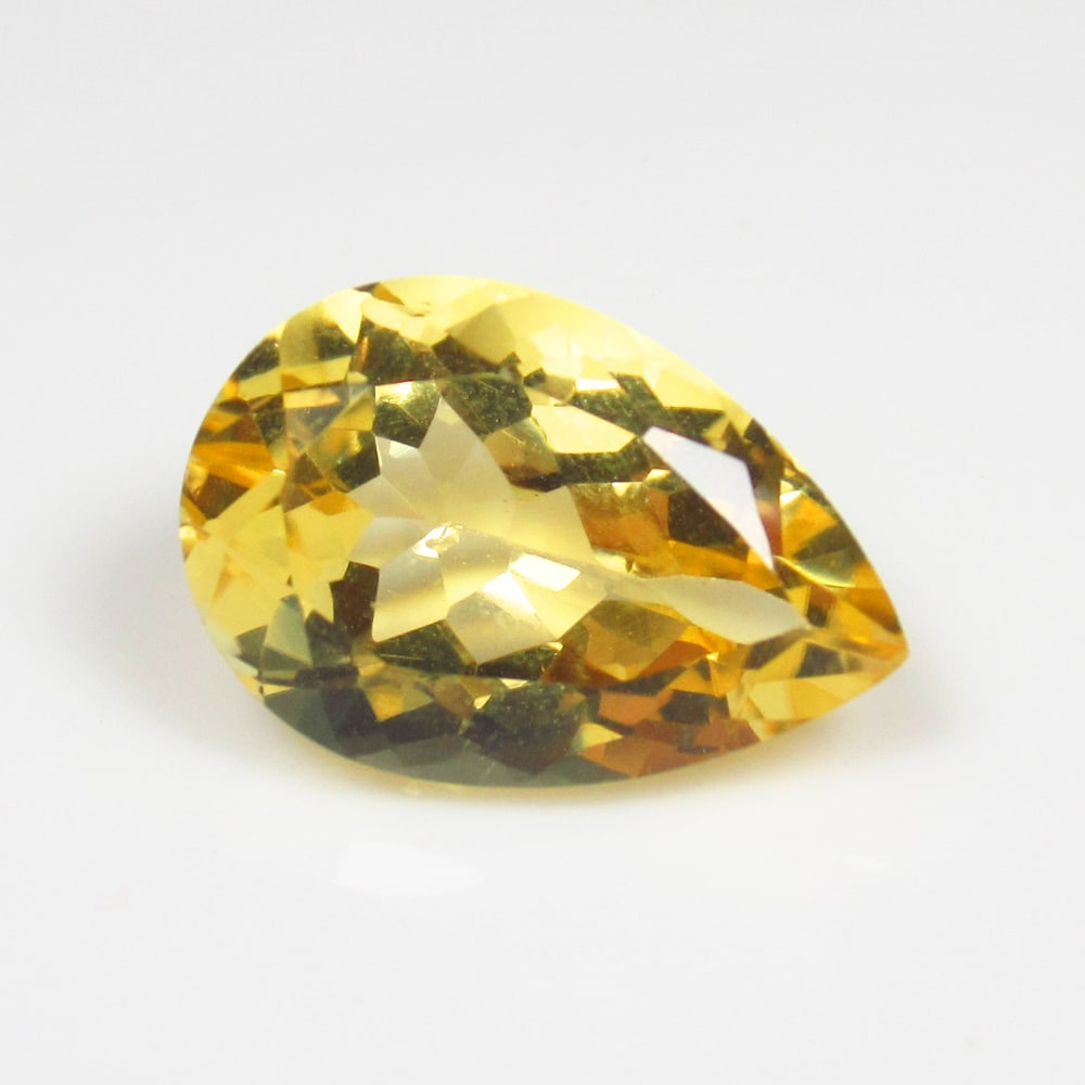 5.65 Ct Natural Citrine Pear Cut: Weight - 5.65 Ct / Size -15.00 x 10.10 x 7.20 mm / Shape - Pear Cut / Color - Yellow / Clarity - VVS / Origin - Brazil / Treatment - Heated