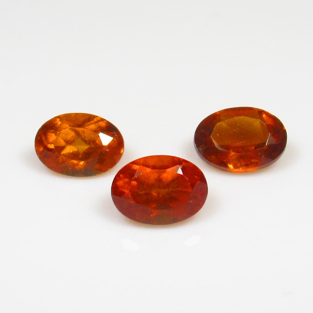 3.38 Ct Natural Orange Hessonite Garnet Oval Cut Set: Weight - 3.38 Ct / Size - 7.1x5.1 - 7.3x5.3 mm / 3 Pc's / Shape - OVal Cut / Clarity - VVS / Origin - Nigeria / Treatment - None