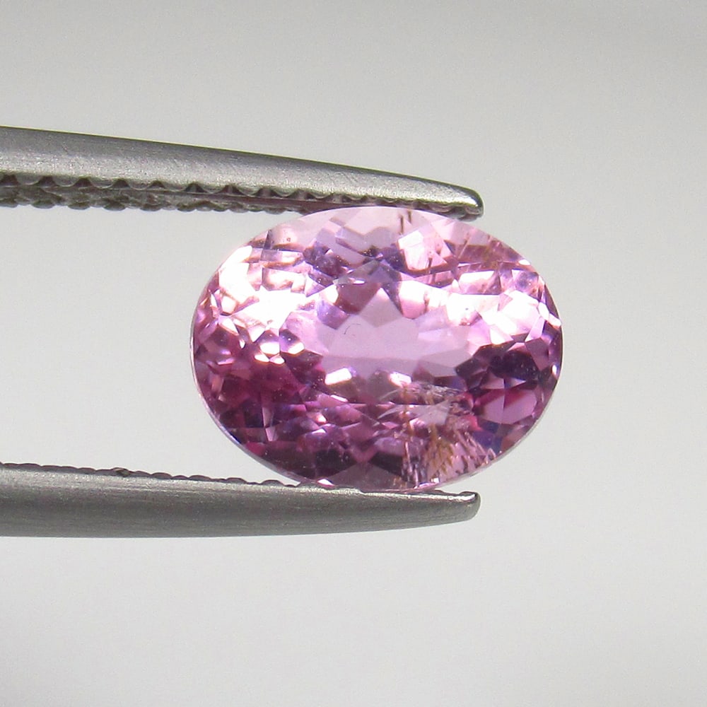 2.22 Ct Natural Sweet Pink Kunzite Oval Cut: Weight - 2.22 Ct / Size - 9.00 x 7.00 x 5.00 mm / Shape - Oval Cut / Color - Sweet Pink / Clarity - VVS / Origin - Afghanisthan / Treatment - None