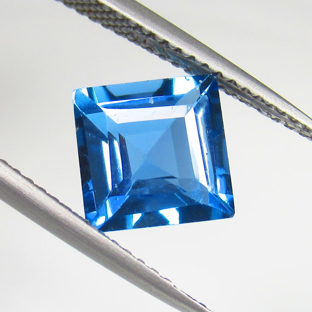 3.11 Ct Natural London Blue Topaz Square Cut: Weight - 3.11 Ct / Size - 8.10 x 8.10 x 5.20 mm / 2 Pc's / Shape - Square Cut / Color - Blue / Clarity - VVS / Origin - Brazil / Treatment - Irradiated