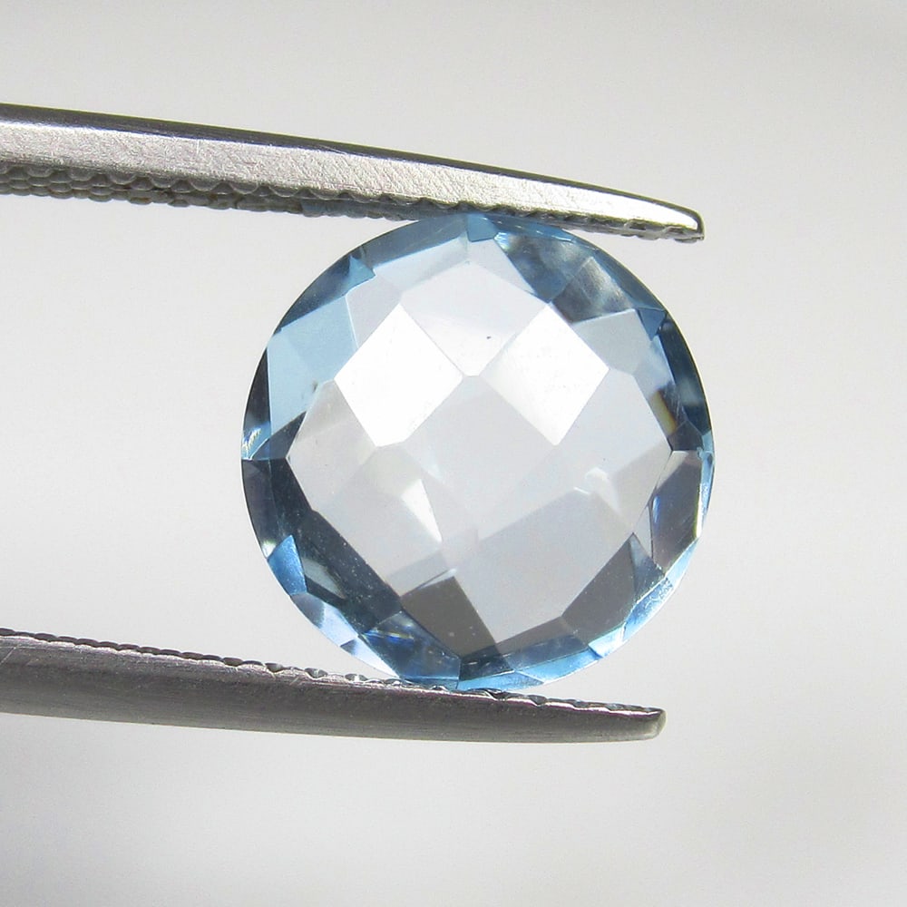 4.78 Ct Natural Blue Topaz Round Checkerboard Cut: Weight - 4.78 Ct / Size - 10.20 x 10.20 x 5.50 mm / Shape - Round Checkerboard Cut / Color - Blue / Clarity - VVS / Origin - Brazil / Treatment - Irradiated
