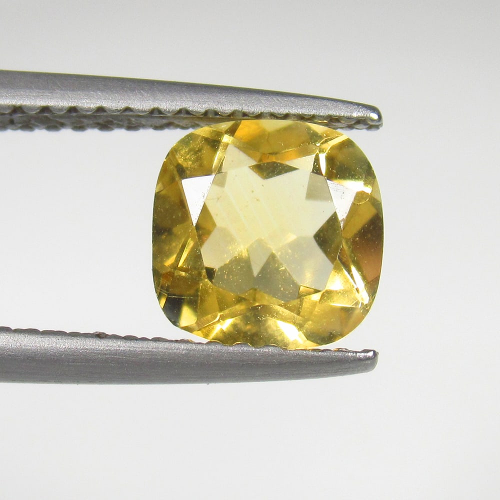 1.56 Ct Natural Citrine Cushion Cut: Weight - 1.56 Ct / Size - 7.20 x 7.20 x 4.80 mm / Shape - Cushion Cut / Color - Yellow / Clarity - VVS / Origin - Brazil / Treatment - Heated