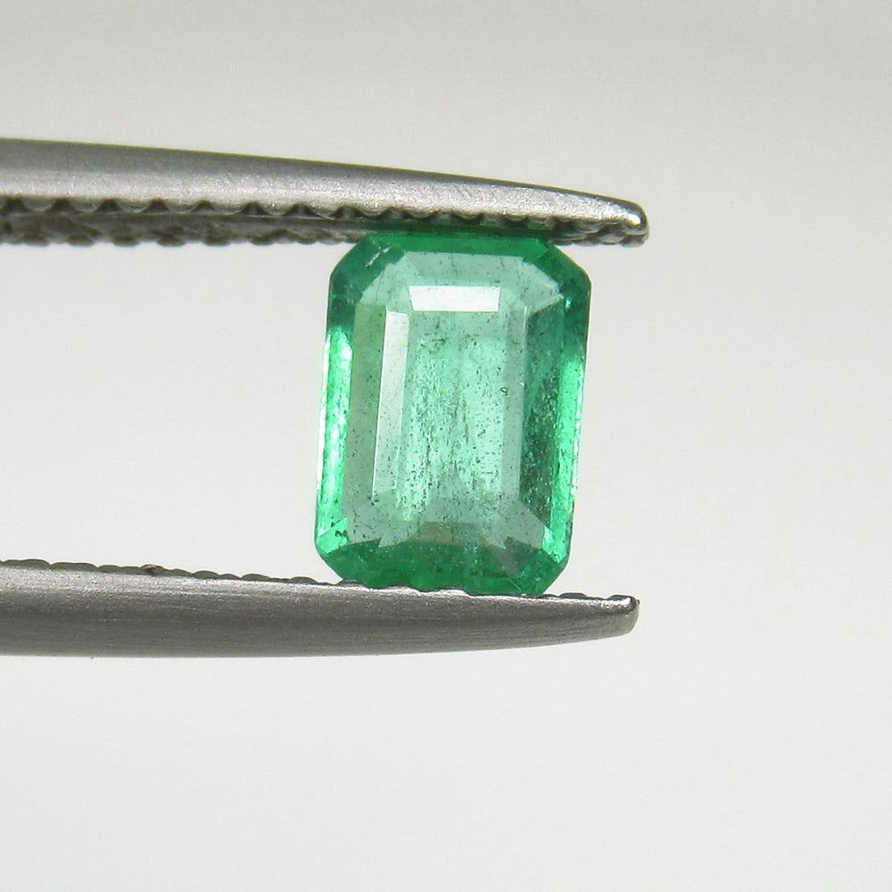 0.58 Ct Natural Zambian Green Emerald Octagon Cut: Weight - 0.58 Ct / Size - 6.70 x 4.80 x 2.50 mm / Shape - Octagon Cut / Color - Green / Clarity - SI / Origin - Zambia / Treatment - Natural Emeralds are commonly enhanced by oil
