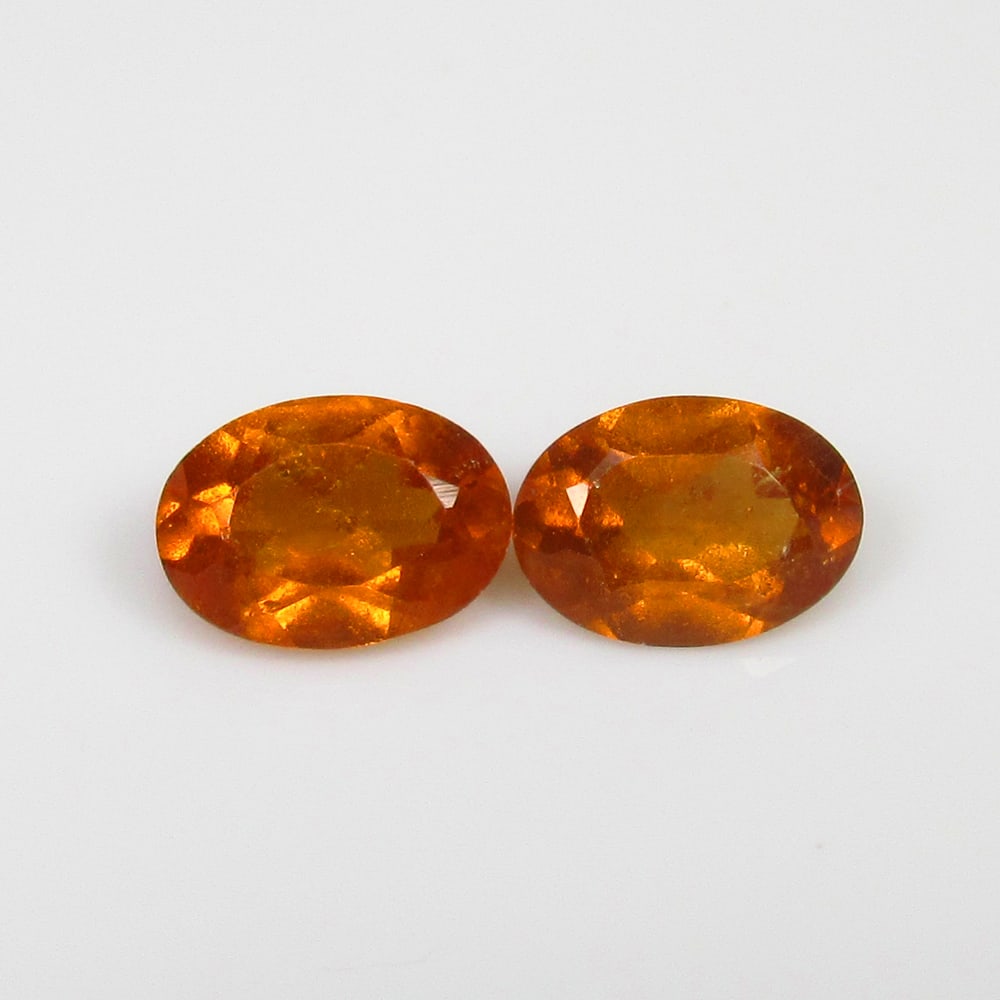 1.91 Ct Natural Orange Hessonite Garnet Oval Cut Pair: Weight - 1.91 Ct / Size - 7.00 x 5.00 x 3.20 mm / 2 Pc's / Shape - Oval Cut / Clarity - VVS / Origin - Nigeria / Treatment - None