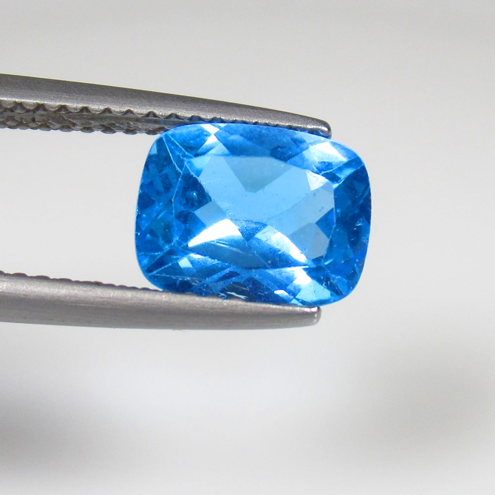 2.64 Ct Natural Blue Topaz Cushion Cut: Weight - 2.64 Ct / Size - 9.10 x 7.00 x 4.90 mm / Shape - Cushion Cut / Color - Blue / Clarity - VVS / Origin - Brazil / Treatment - Irradiated