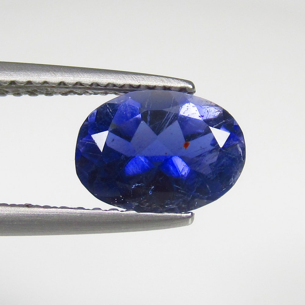 1.53 Ct Natural Iolite Oval Cut: Weight - 1.53 Ct / Dimensions - 9.10 x 6.50 x 4.60 mm / Shape & Cut - Oval Cut / Color - Blue / Transparency - Transparent / Origin - India / Comments - None