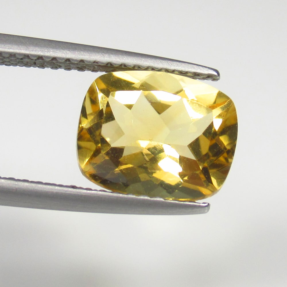 2.76 Ct Natural Yellow Citrine Cushion Cut: Weight - 2.76 Ct / Size - 10.00 x 8.10 x 5.60 mm / Shape - Cushion Cut / Color - Yellow / Clarity - VVS / Origin - Brazil / Treatment - Heated