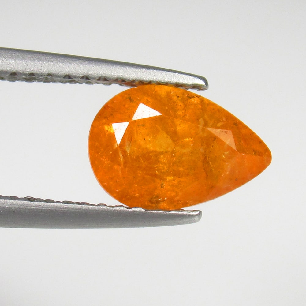 2.03 Ct Natural Fanta Orange Spessarite Garnet Pear Cut: Weight - 2.03 Ct / Size - 9.00 x 6.30 x 4.50 mm / Shape - Pear Cut / Clarity - SI / Origin - Madagascar / Treatment - None