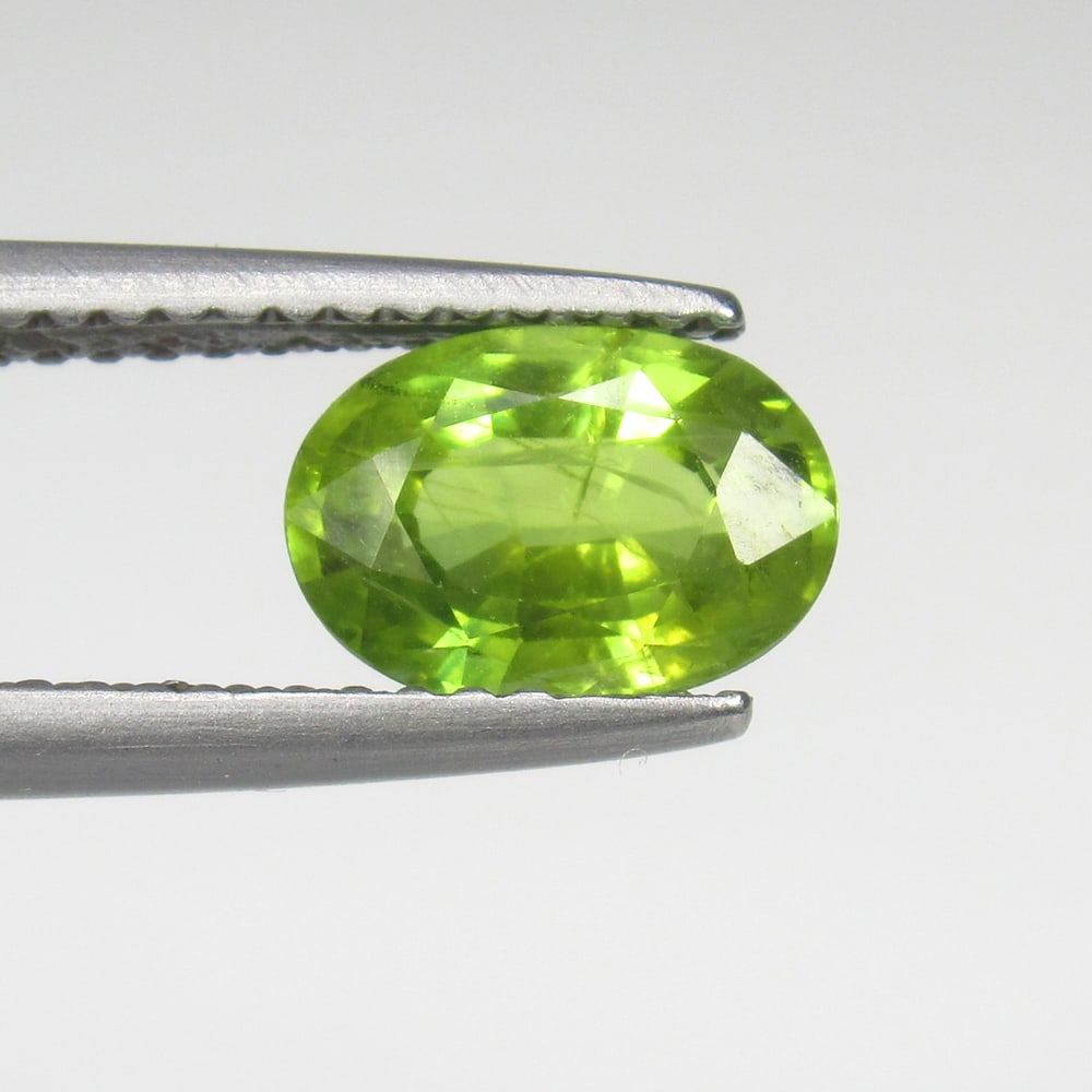 1.78 Ct Natural Green Sapphire Oval Cut: Weight - 1.78 Ct / Size- 8.20 x 5.80 x 4.00 mm / Shape - Oval Cut / Clarity - VVS / Origin - Sri Lanka / Treatment - Standard Heated