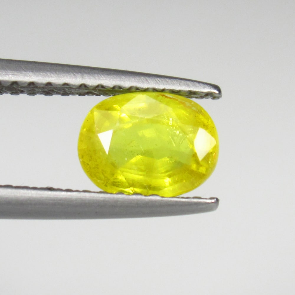 1.46 Ct Natural Yellow Sapphire Oval Cut: Weight - 1.46 Ct / Size- 7.10 x 5.40 x 3.90 mm / Shape - Oval Cut / Clarity - VVS / Origin - Sri Lanka / Treatment - Standard Heated