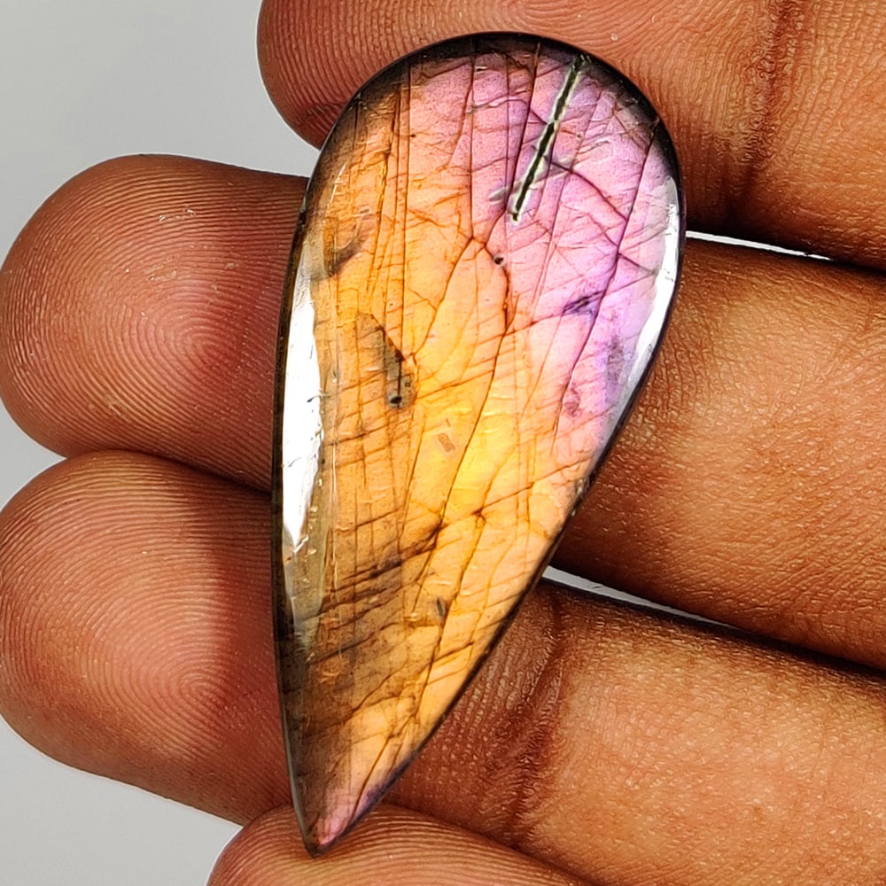 34.97 Ct Natural Blue Shaded Labradorite Pear Cab: Weight - 34.97 Ct / Size - 41.00 x 18.60 x 5.70 mm / Shape - Excellent Pear Cab / Clarity - Opaque / Origin - Africa / Treatment - None