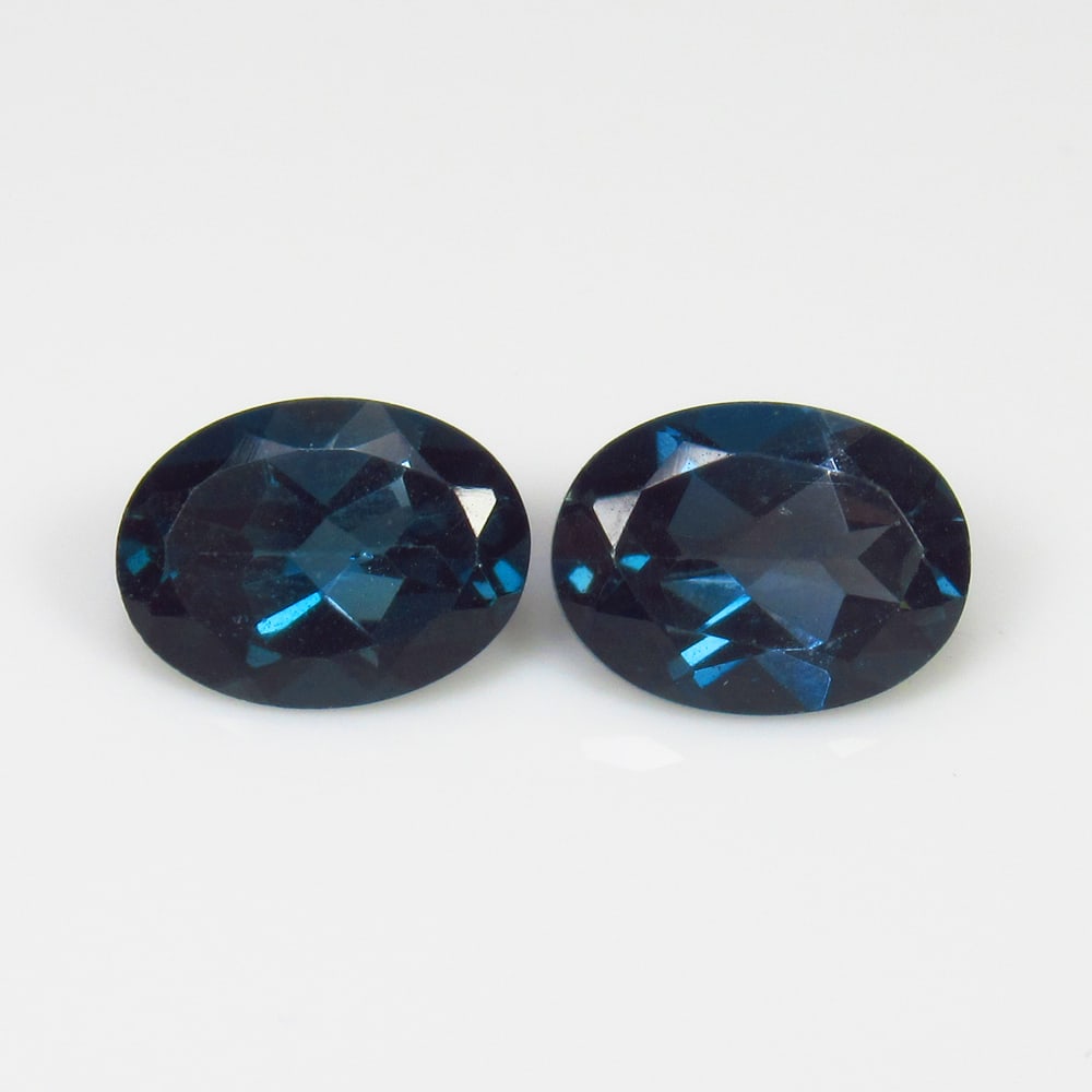 2.72 Ct Natural London Blue Topaz Oval Cut Pair: Weight - 2.72 Ct / Size - 7.90 x 5.90 x 3.80 mm / 2 Pc's / Shape - Oval Cut / Color - Blue / Clarity - VVS / Origin - Brazil / Treatment - Irradiated