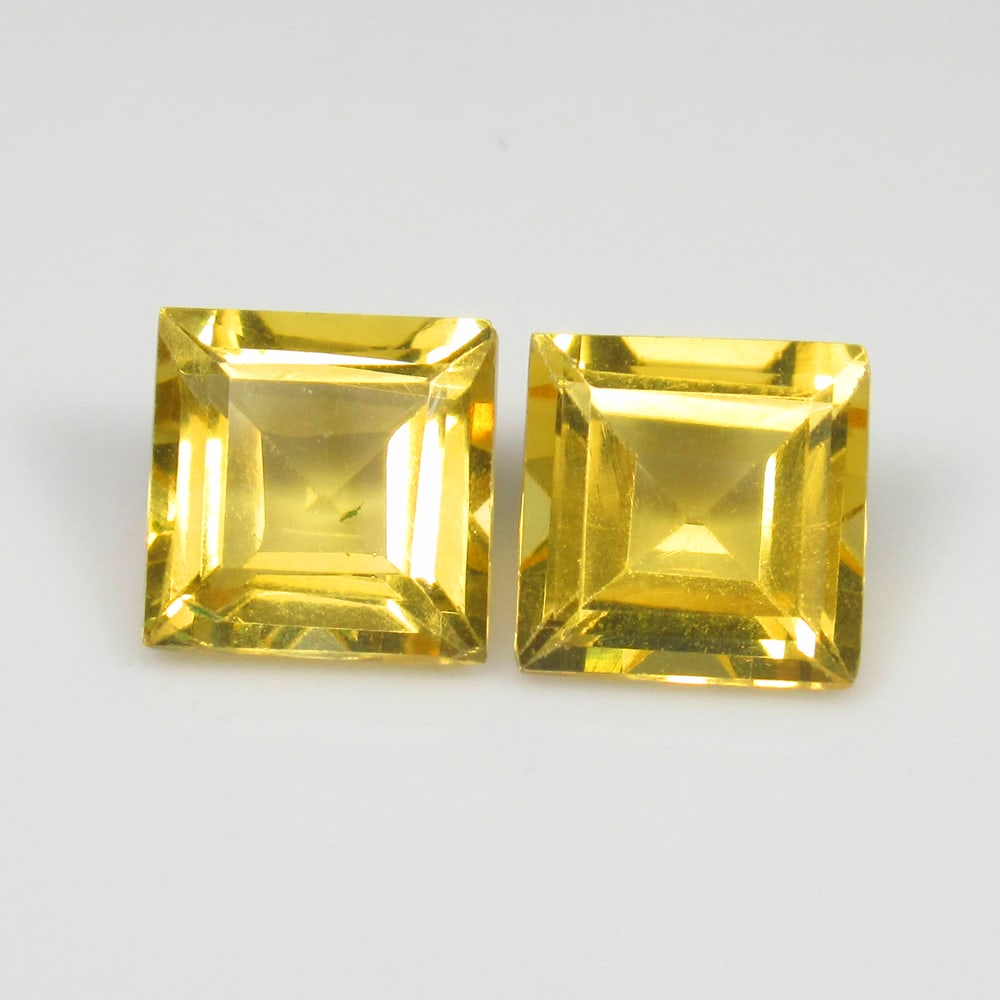 3.02 Ct Natural Yellow Citrine Square Cut Pair: Weight - 3.02 Ct / Dimensions -7.20 x 7.00 x 4.40 mm / 2 Pc's / Shape - Square Cut / Color - Yellow / Clarity - VVS / Origin - Brazil / Treatment - Heated