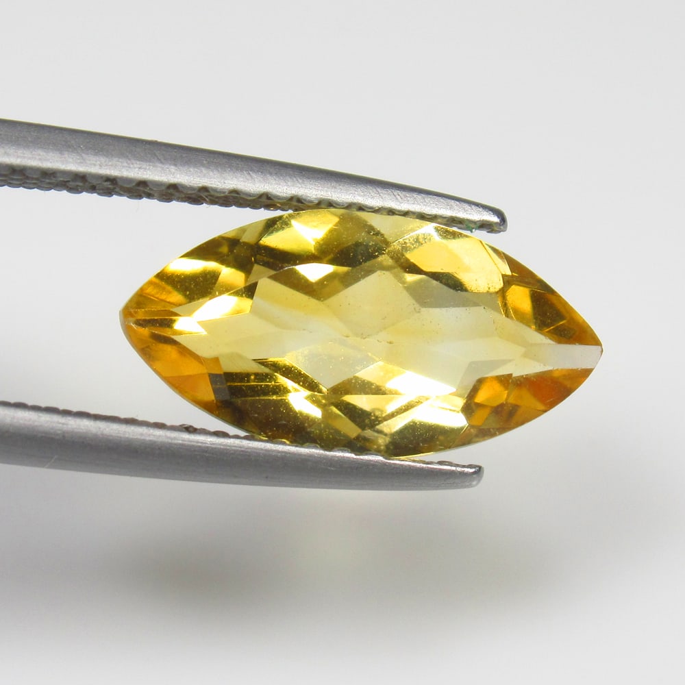 2.20 Ct Natural Yellow Citrine Marquise Cut: Weight - 2.20 Ct / Dimensions - 13.80 x 7.00 x 4.40 mm / Shape - Marquise Cut / Color - Yellow / Clarity - VVS / Origin - Brazil / Treatment - Heated