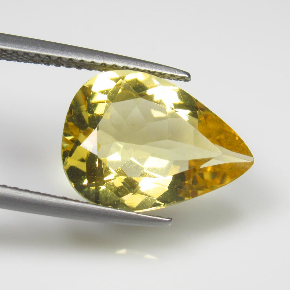 5.39 Ct Natural Yellow Citrine Pear Cut: Weight - 5.39 Ct / Dimensions - 15.20 x 11.10 x 6.40 mm / Shape - Pear Cut / Color - Yellow / Clarity - VVS / Origin - Brazil / Treatment - Heated