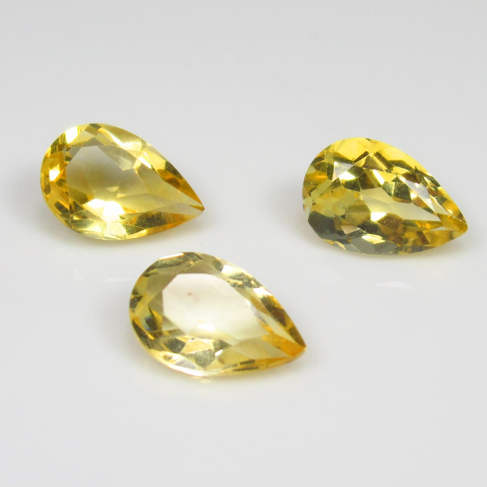 3.77 Ct Natural Yellow Citrine Pear Cut Set: Weight - 3.77 Ct / Dimensions - 9.0x6.1 - 9.2x6.2 mm / 3 Pc's / Shape - Pear Cut / Color - Yellow / Clarity - VVS / Origin - Brazil / Treatment - Heated