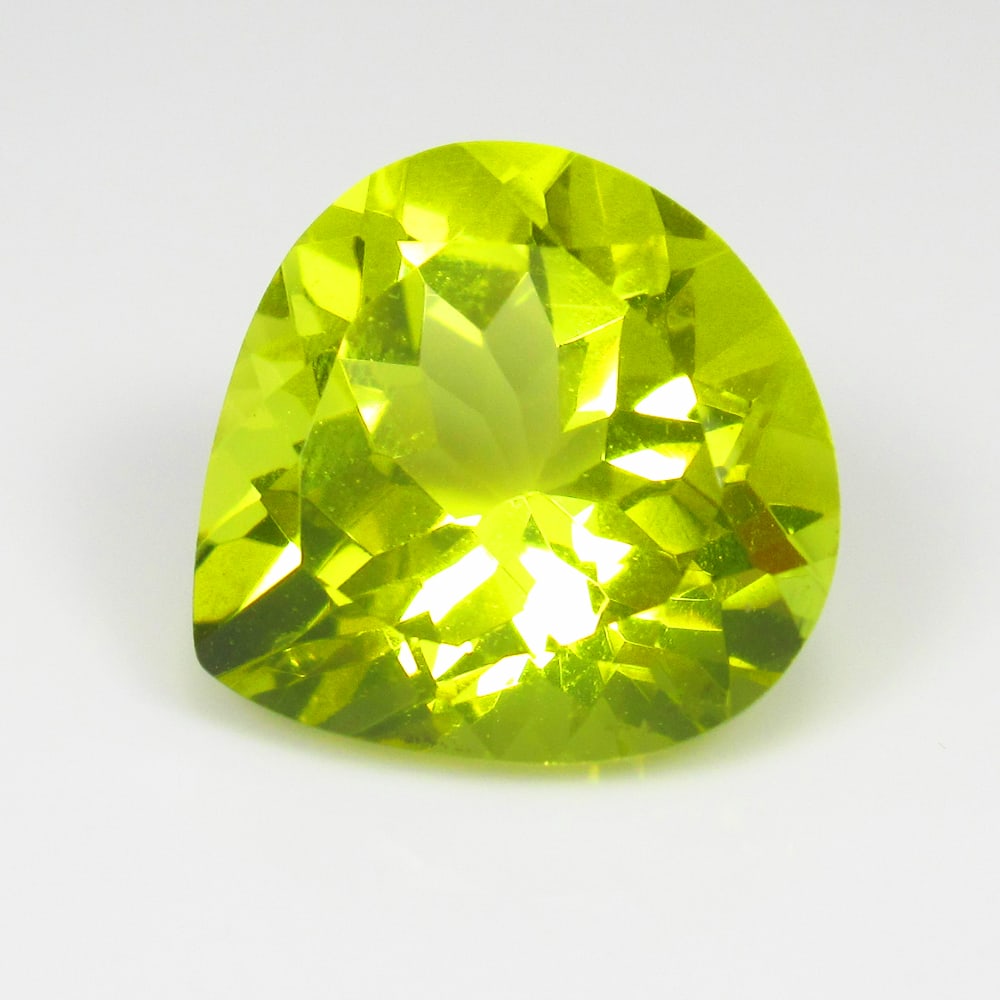 6.75 Ct Natural Lemon Quartz Pear Cut: Weight - 6.75 Ct / Size - 13.30 x 13.10 x 8.30 mm / Shape - Pear Cut / Clarity - VVS / Origin - Brazil / Treatment - Heated