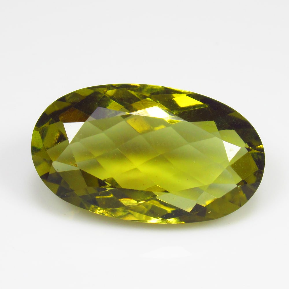 16.59 Ct Natural Lemon Quartz Oval Checkerboard Cut: Weight - 16.59 Ct / Size - 23.00 x 13.30 x 8.60 mm / Top Quality Luster / Excellent Oval Checkerboard Cut / Origin - Brazil / Treatment - Heated