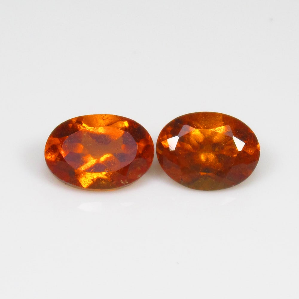 2.01 Ct Natural Orange Hessonite Garnet Oval Cut Pair: Weight - 2.01 Ct / Size - 7.20 x 5.00 x 3.50 mm / 2 Pc's / Shape - Oval Cut / Clarity - VVS / Origin - Nigeria / Treatment - None